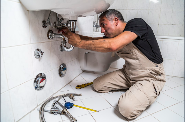 Plumber at work